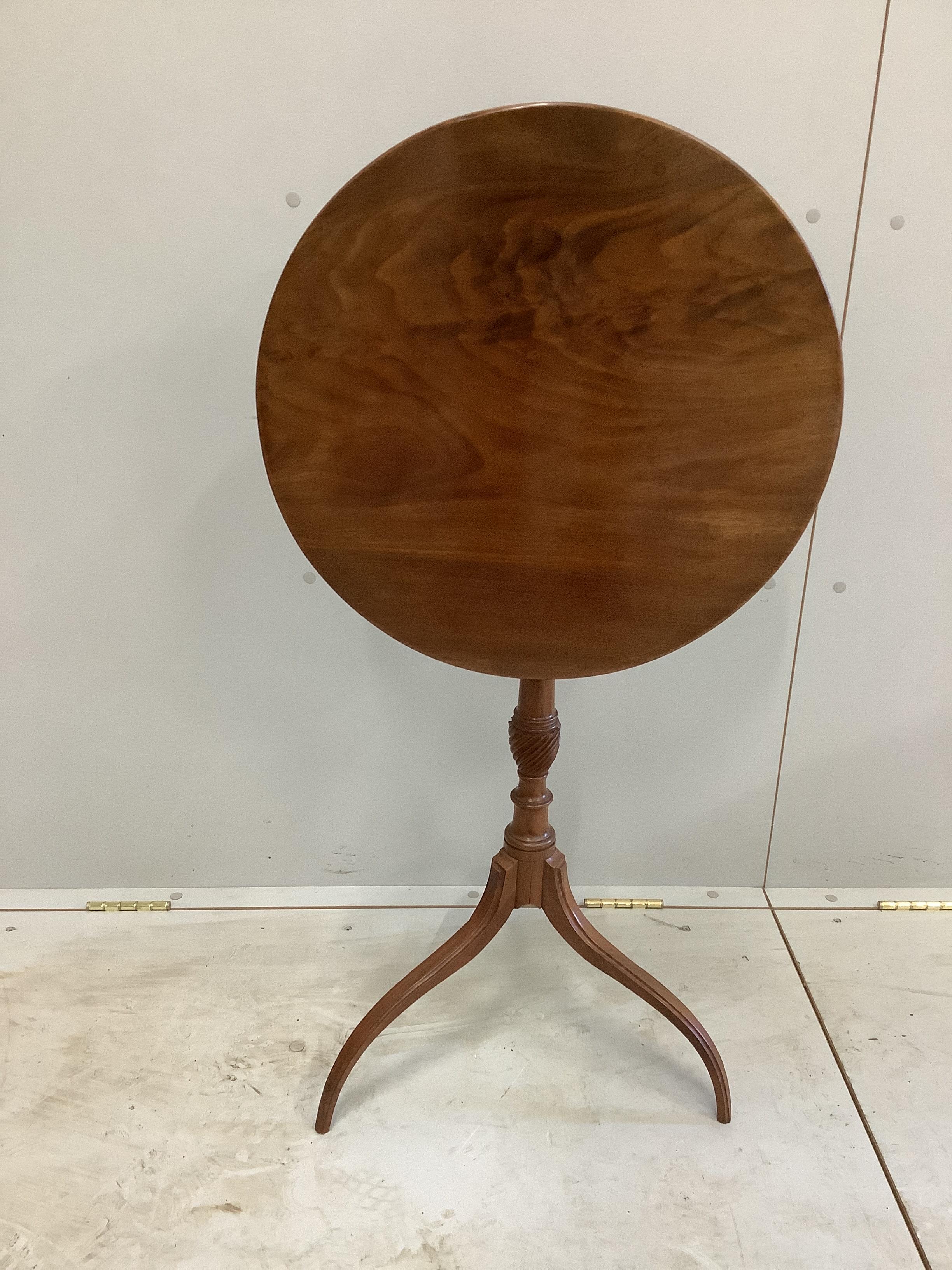 An Edwardian Sheraton style mahogany circular top tripod wine table, diameter 50cm, height 69cm